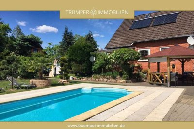 Wohnen mit Urlaubsflair: Haus mit Pool und großem Garten in Reppenstedt