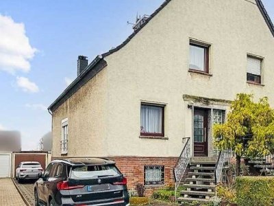 Doppelhaushälfte mit 5 Zimmern Garten und Garage in Hamm-Heessen