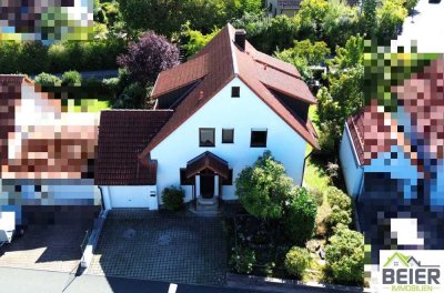 Charmantes Ein- bis Zweifamilienhaus mit 172 m² Wohnfläche und sonnigem Garten