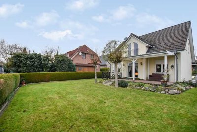 Liebevolles Einfamilienhaus aus 2003 mit schön angelegtem Garten und Carport im Herzen von Ratekau!