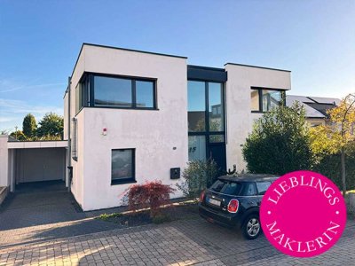 Moderne Architektur trifft nachhaltige Technik – Passivhaus gewachsener Nachbarschaft