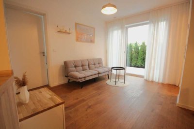 Teilmöbilierte moderne Einliegerwohnung mit Terrasse  - Erstbezug!
