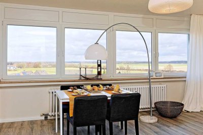 Liebevoll sanierte 3,5 Zimmerwohnung mit Balkon mit einem wunderbaren Panoramagrünblick