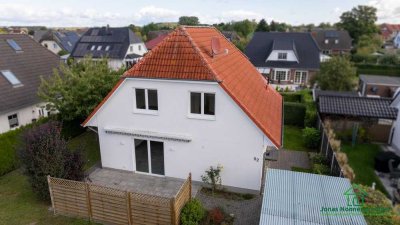Einfamilienhaus mit Carport und Garten