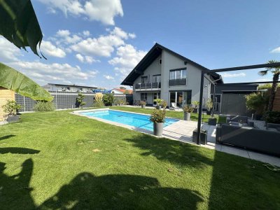 Exklusives Anwesen mit Gartenanlage und zusätzlichem Baugrundstück im Gewerbegebiet