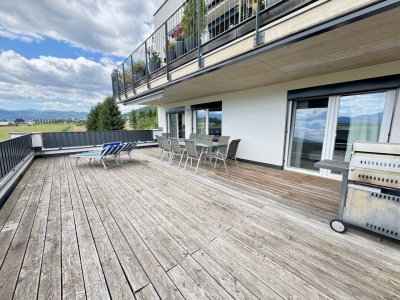 Traumhafte Eigentumswohnung mit riesiger Südwestterrasse und Carportstellplatz