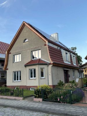 Wohnung im 2 Familienhaus mit großem Garten und 12 m2 Terrasse