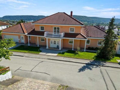 Sonnenverwöhnte Eleganz – Villa mit vielseitiger Einliegerwohnung und mediterranem Charme