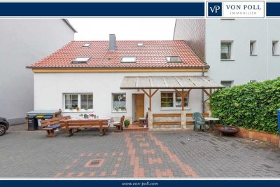 Vielseitiges Einfamilienhaus mit Studio, großem Garten und Doppelgarage