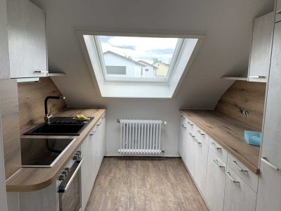 DG-Wohnung in 3-Fam-Haus mit EBK und Garage