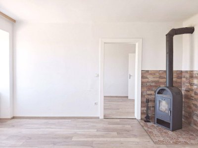 Sanierte 4 Zimmer Wohnung im Haus mit einem großen Garten