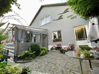 Großzügige 4-Zi EG-Wohnung mit Garage und Wintergarten - optional 2 weitere Wohnungen im Haus
