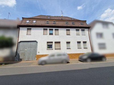 6% Rendite: Lukratives 11-Parteien- Mehrfamilienhaus mit großem Hof und 2 Garagen