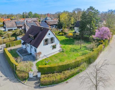 Einfamilienhaus mit großem Garten und zusätzlichen Grundstück in Top-Lage