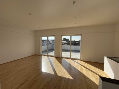 Moderne und gepflegte Penthouse-Wohnung mit 2 Stellplätzen in zentraler Lage