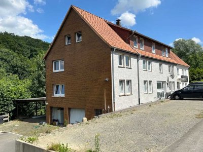 Vollvermietetes Mehrfamilienhaus mit Garagen und Carport