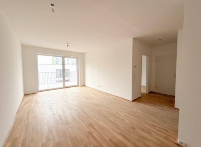 Erstbezug 2-Zimmer-Wohnung in Wels: Balkon, Einbauküche und Fußbodenheizung!