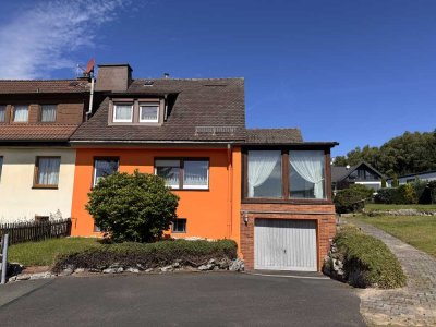 Wohnen  "Am Pfaffenberg" - Doppelhaushälfte mit Garage und Garten