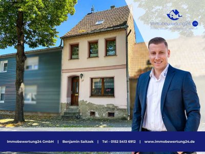 Familienfreundliches Reihenhaus mit Gartenidylle und Ausbaupotenzial!