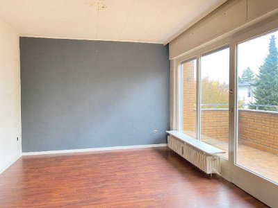 Wohnen im Grünen! Lichtdurchflutete Wohnung mit Balkon. Garten- und Garagenoption!