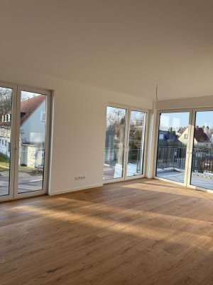 Erstbezug mit Balkon und Einbauküche: Geschmackvolle 3-Zimmer-Wohnung in Strandnähe