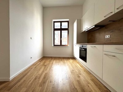*Erstbezug*: 3-Raum-Wohnung mit Terrasse, hochwertiger EBK und Tageslichtbad in bester Wohnlage