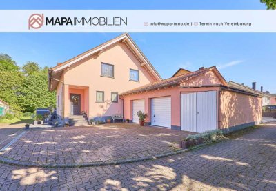 Einfamilienhaus mit Doppelgarage und großem Garten in ruhiger Lage