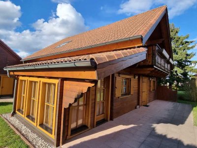 Charmantes Holzhaus mit großem Garten – Ihr neues Zuhause im Grünen!