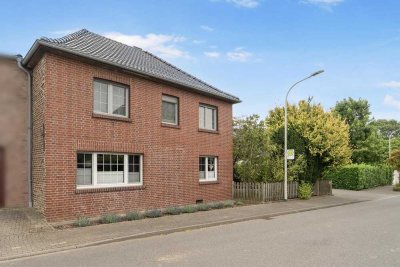 Familienfreundliches Reiheneckhaus mit großem Grundstück und Nebengebäuden