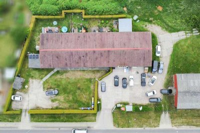 Attraktives Kapitalanlageobjekt: Mehrfamilienhaus mit Gewerbeeinheit und solider Rendite