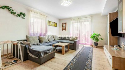 Charmantes Mehrfamilienhaus mit 3 Einheiten, Garten & Ausbaupotenzial in zentraler Lage