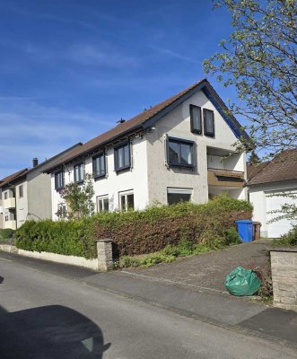 Freundliche 3-Zimmer-Wohnung mit gehobener Innenausstattung mit Balkon und EBK in Markthedenfeld.
