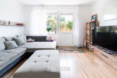 Sanierte 2-Zimmer-Erdgeschosswohnung mit Terrasse, Garten und Garage im Grünen