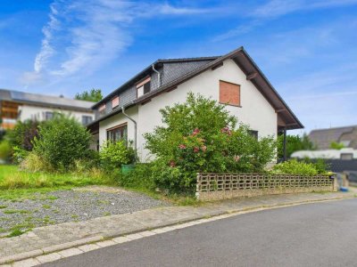 Familienfreundlich & Rendite–Zweifamilienhaus mit Einliegerwohnung