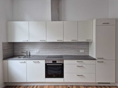 Stilvolle 2,5-Zimmer-Erdgeschosswohnung mit Terrasse in zentraler Lage