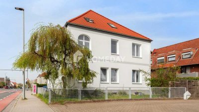 Attraktive Investitionsmöglichkeit: Mehrfamilienhaus mit 3 Wohneinheiten und Garten