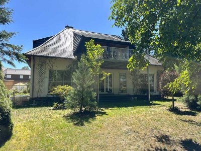 Einfamilienhaus mit großem Grundstück, einzigartigem Seeblick und optionalem Bootshaus