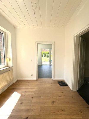 Renovierte EG Wohnung mit Küche, großer Terrasse und Garten!