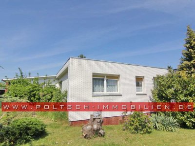 EFH im Bungalowstil mit Wintergarten, Keller und großem Grundstück in ruhiger Siedlungslage