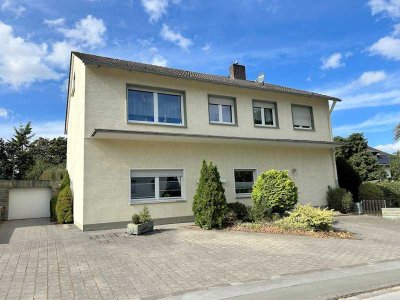 Viel Platz für die Familie oder auch Generationen! Solides Ein-/Zweifamilienhaus mit Garage in