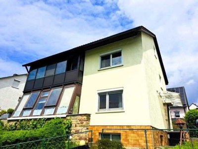 3,5 Zimmerwohnung mit Wintergarten und eigenem Garten mit Terrasse  in Südseite!