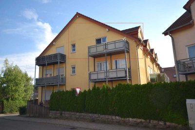 Charmante 1-Zi.-DG-Wohnung mit Balkon und TG-Platz