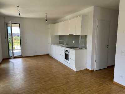 Wohnen in den Berghöfen mit großer überdachter Dachterrasse und Loggia