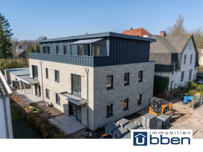 Neubau 3-Zimmer-Erdgeschosswohnung mit Terrasse & Carport, in zentraler Lage