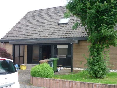 Ansprechende und gepflegte 4-Raum-EG-Wohnung mit Terasse, Garten und Garage