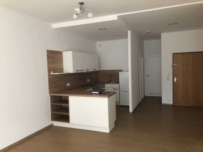 Gepflegte 2-Zimmerwohnung mit moderner Einbauküche und Balkon im Zentrum