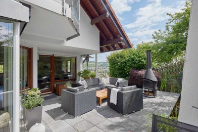 Exklusives Einfamilienhaus in Hanglage mit Wintergarten, idyllischem Garten und Doppelgarage