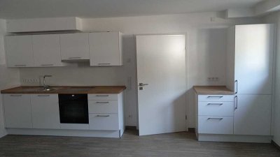 Attraktive Erstbezug  1-Zimmer-Souterrain-Wohnung mit gehobener Innenausstattung mit EBK in Wittlich