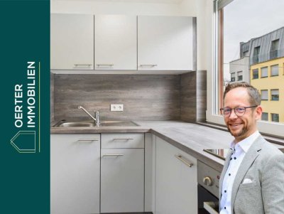 Umfassend sanierte 1-Zimmer Wohnung mit Einbauküche und Balkon in den Innenhof!