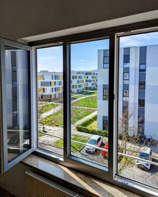 2-Zimmer Dachgeschosswohnung mit bis zu 3,80 m hohen Decken und Balkon